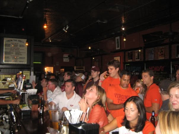 A crowded Virginia Tech game-day gathering in a New York bar