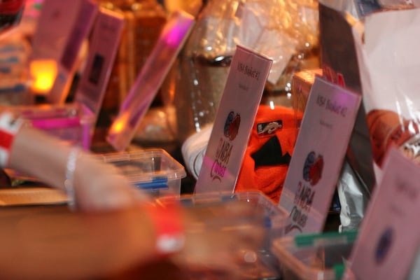 Silent-auction items displayed at Maroon Effect