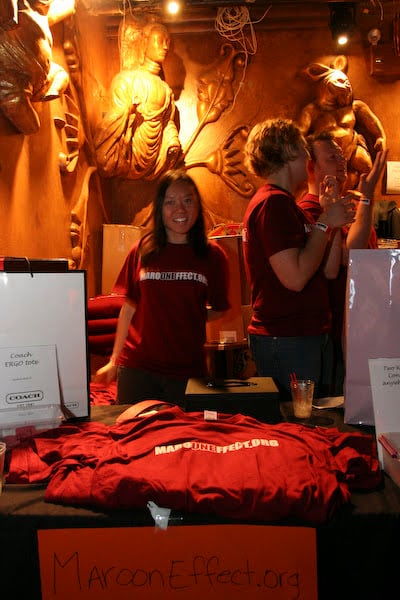 A volunteer at the Virginia Tech merchandise table